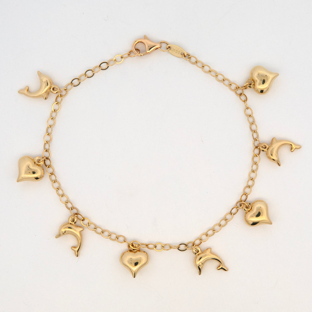 14K Yellow Gold Dolphin & Puffed Heart Charm Bracelet