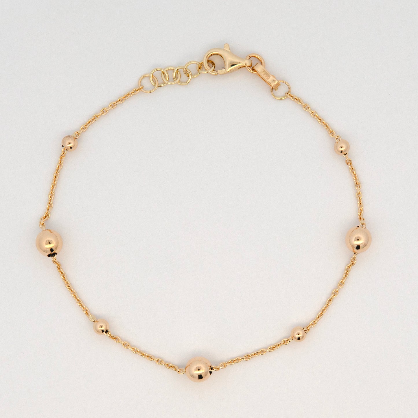 14K Yellow Gold Small Graduated Polished Bead Station Bracelet