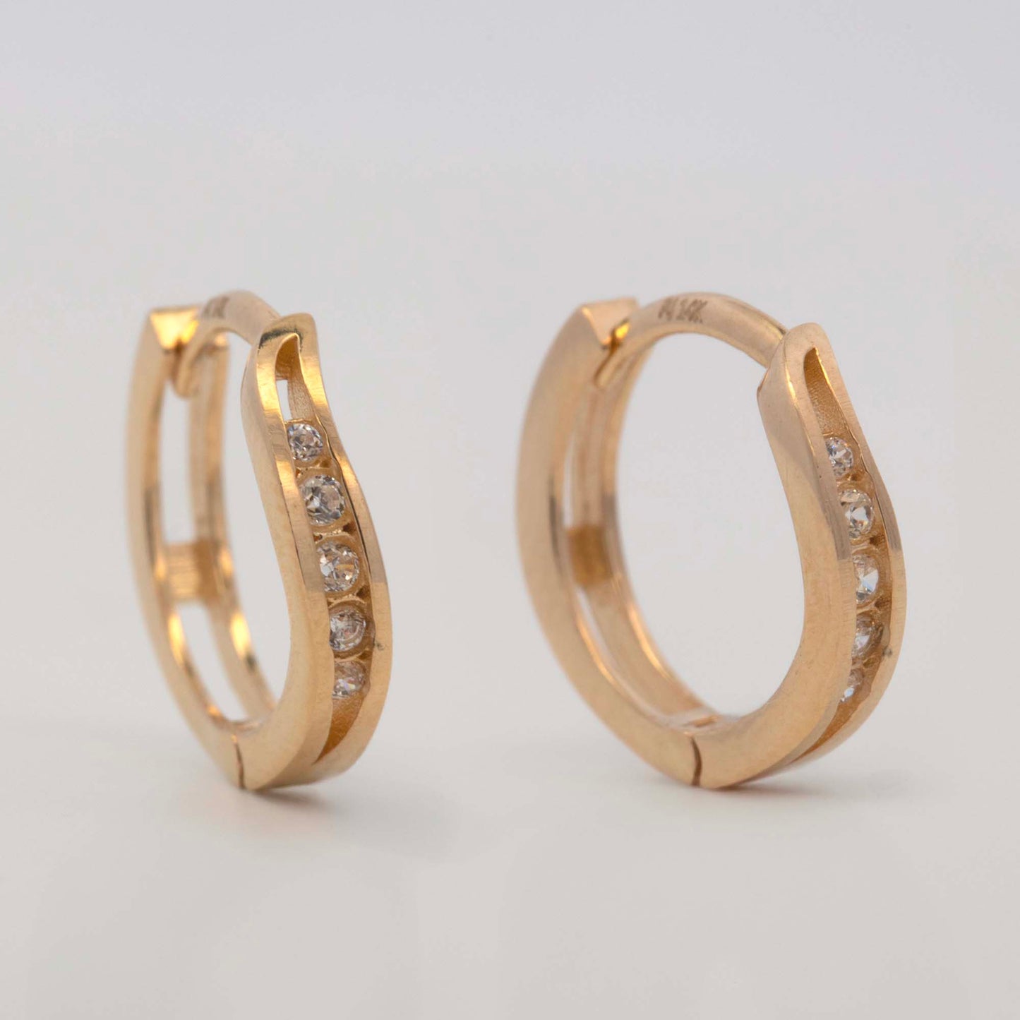 14k Yellow Gold CZ Line Wavy Huggie Earring
