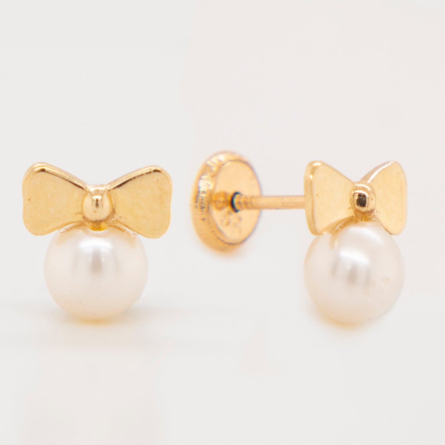 14K Yellow Gold Polished Bow with Mother of Pearl Screwback Earrings