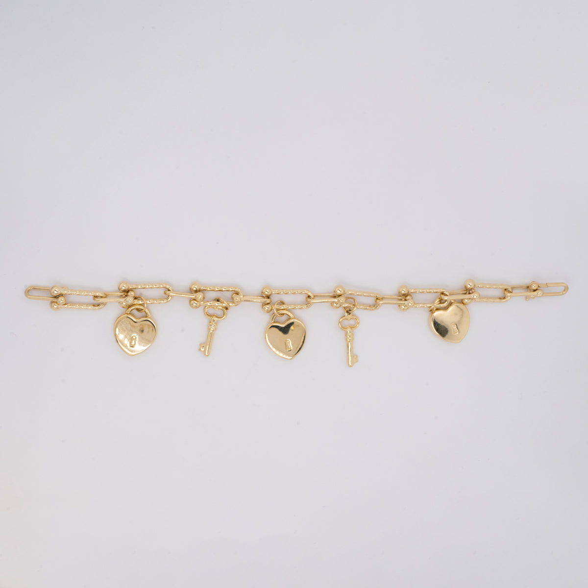 14K Yellow Gold Paper Clip Chain With Dangling Heart Lock And Key Women's Bracelet
