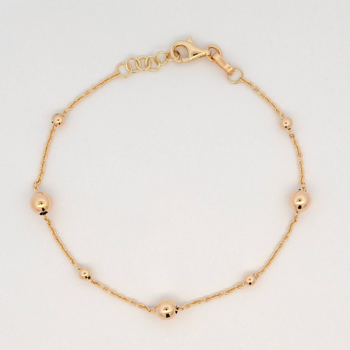 14K Yellow Gold Small Graduated Polished Bead Station Bracelet