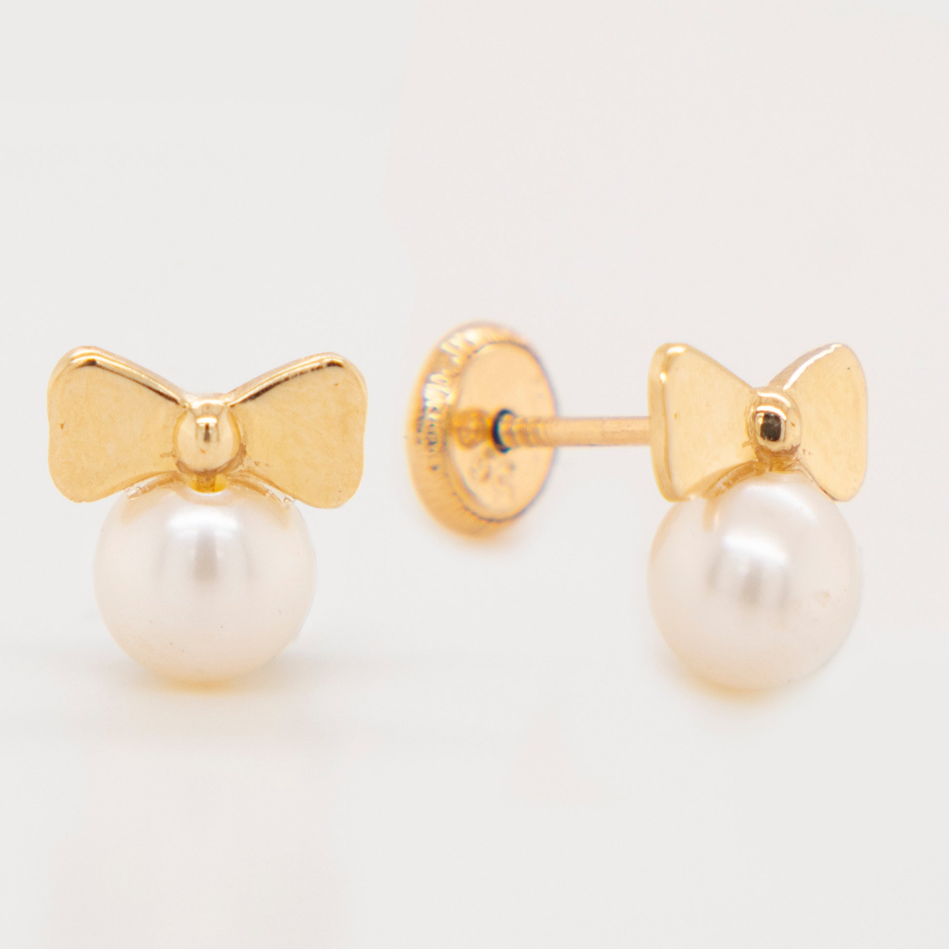 14K Yellow Gold Polished Bow with Mother of Pearl Screwback Earrings